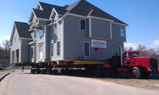 Illustration for article titled This truck is so big, it could pull a house!